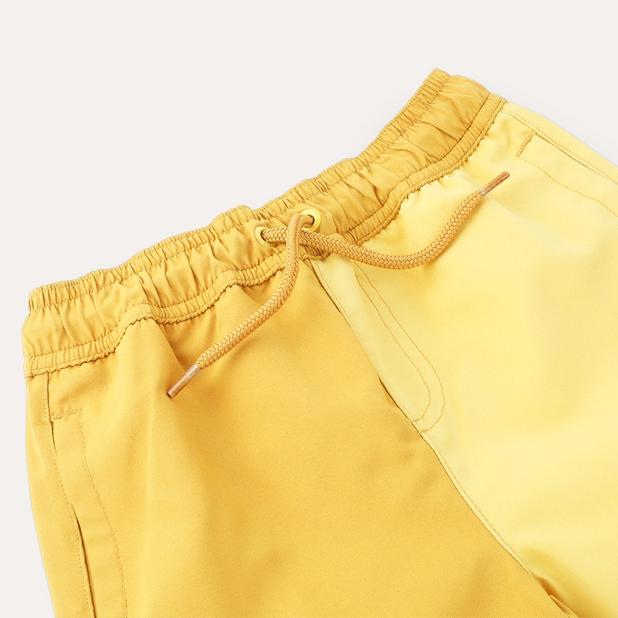 Buy the KIDLY Label Recycled Swim Shorts at KIDLY UK