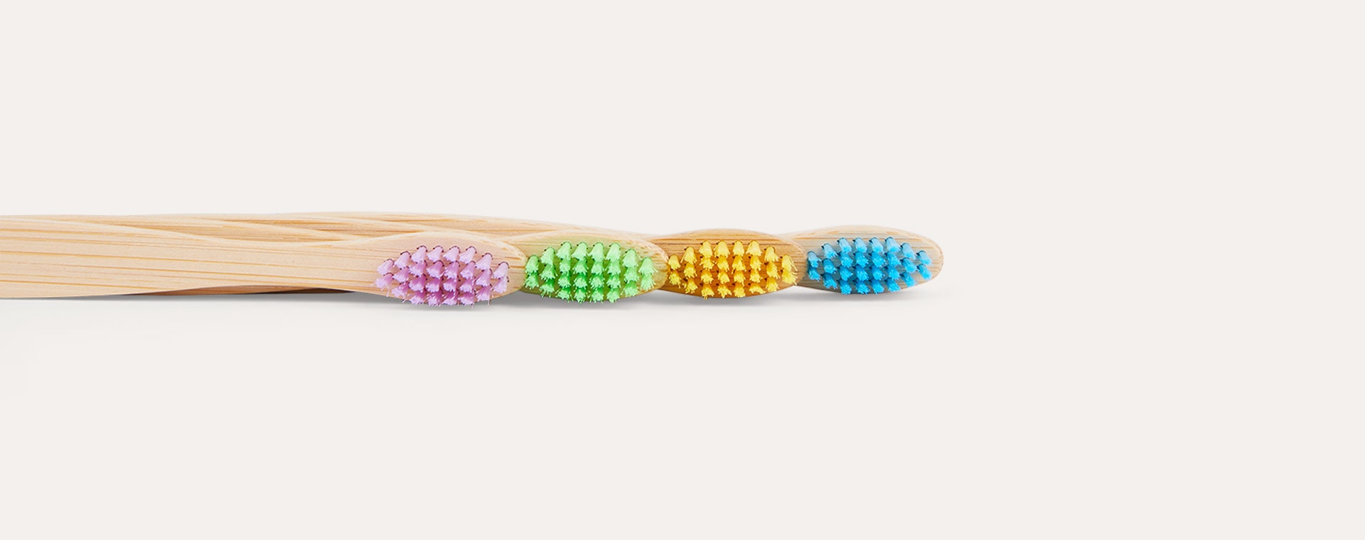 Yellow, Blue, Purple & Green Wild & Stone 4-Pack Organic Children's Bamboo Toothbrush